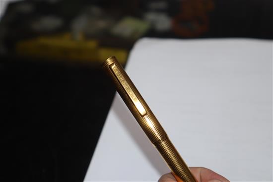 A Dunhill gold-plated fountain pen, 14ct gold nib, a miniature guilloche enamel propelling pencil and eight other items